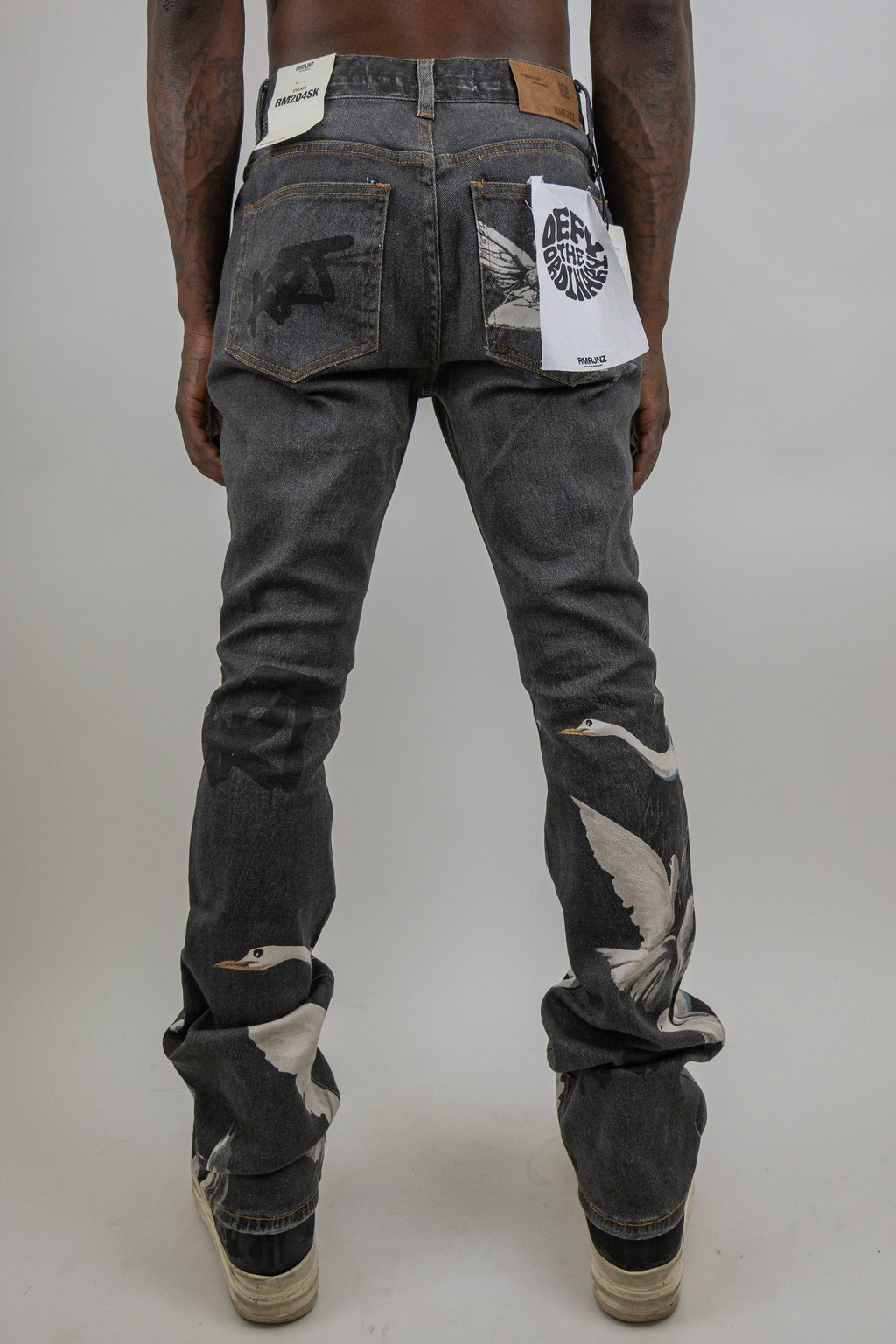 ARMOR JEANS RM204SK graphic printed stacked jeans, showcasing stylish layered denim with bold graphic designs and a modern fit.