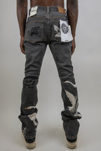 ARMOR JEANS RM204SK graphic printed stacked jeans, showcasing stylish layered denim with bold graphic designs and a modern fit.