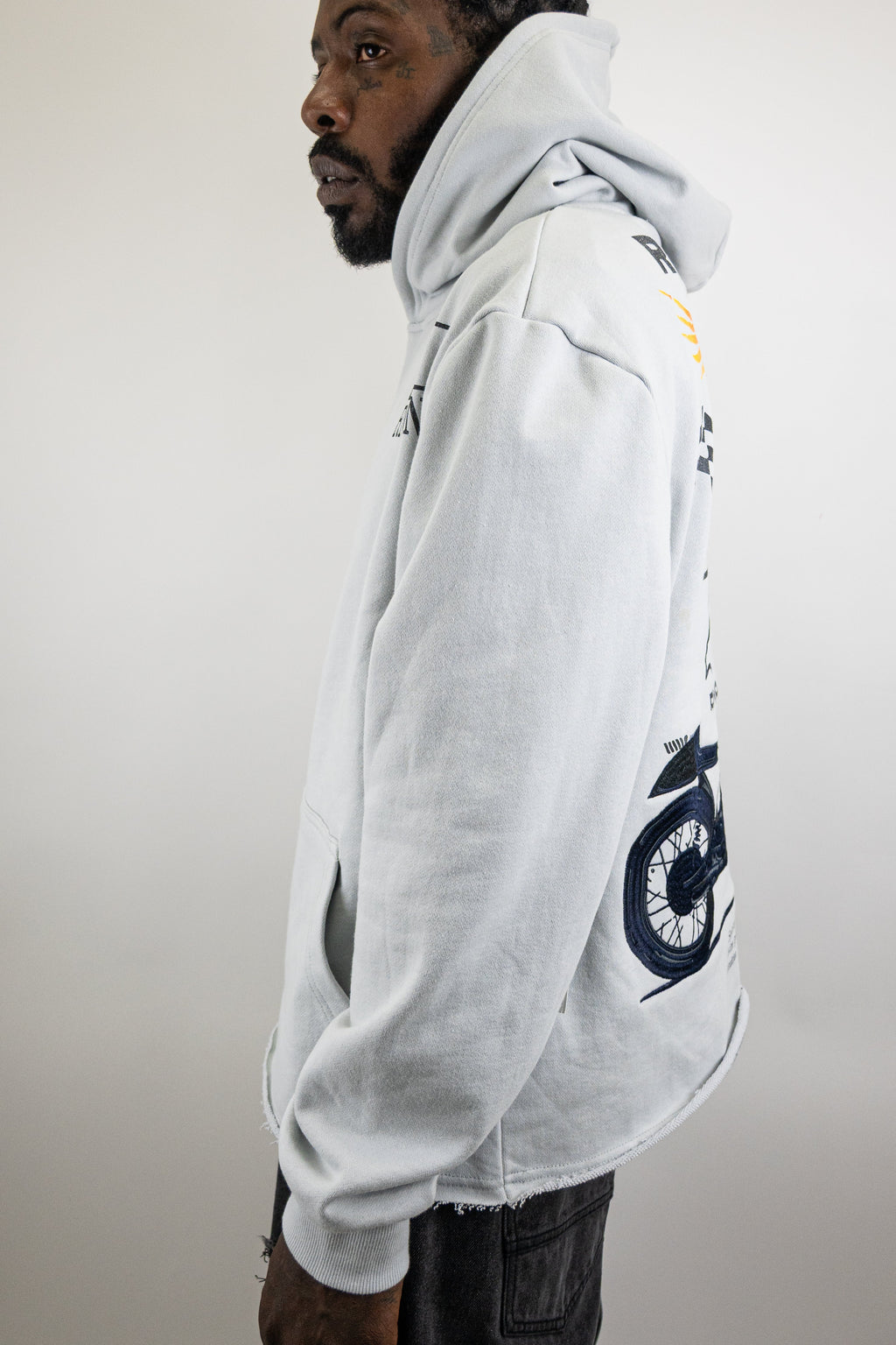 ARMOR JEANS RM1181C Moto Cropped Hoodie, black outerwear with a zip-up front and motorcycle-inspired design.