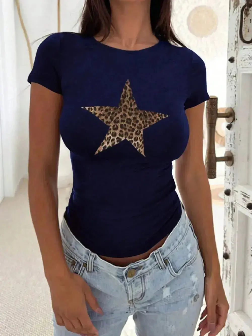 Women's round neck short sleeve T-shirt by Plush Fashion Hub made of soft, stretch viscose fabric featuring a classic design.