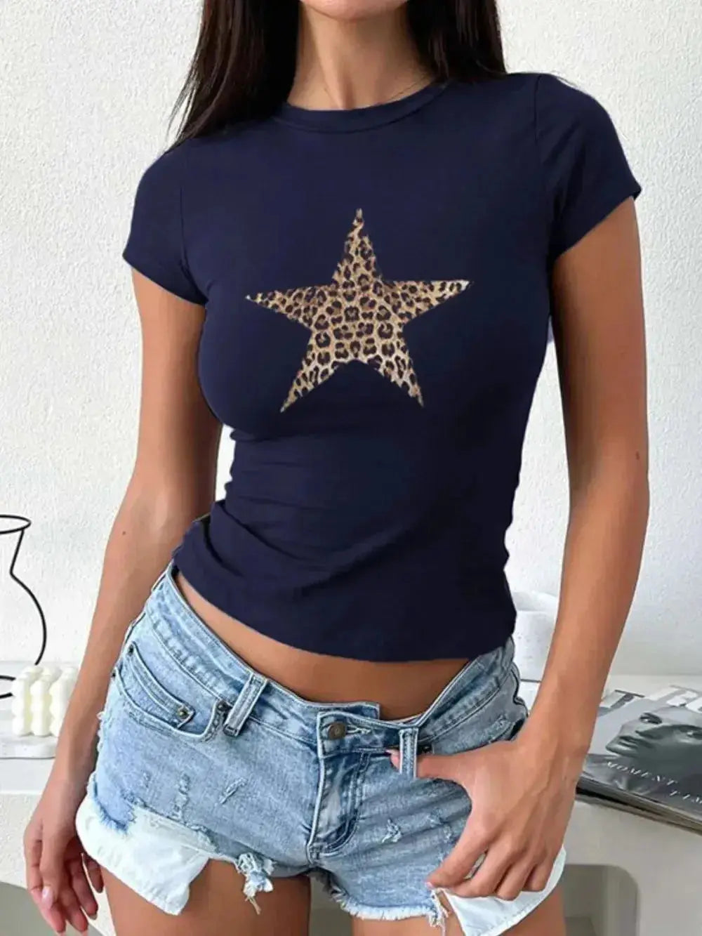 Women's Plush Fashion Hub essential round neck short sleeve T-shirt in premium viscose stretch fabric, close-up of the fit and fabric texture.
