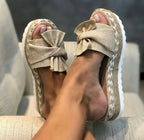 Women’s bow sandals with platform wedge heel by Trendy Attic Store01, featuring stylish bow detail and comfortable slip-on design.