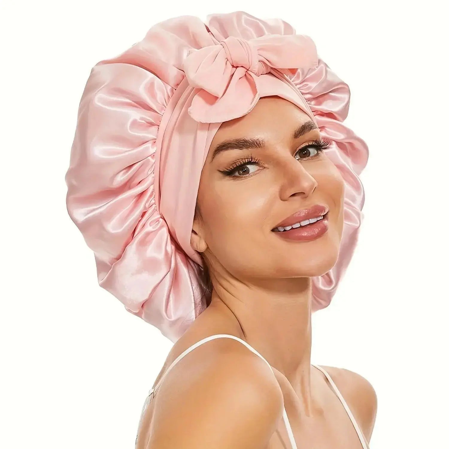 Double-layer satin hair bonnet with ribbon bow for hair protection, soft sleep cap from Plush Fashion Hub.