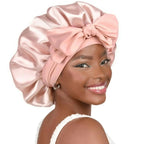 Double-layer satin ribbon hair bonnet from Plush Fashion Hub, designed for hair protection and sleep comfort.