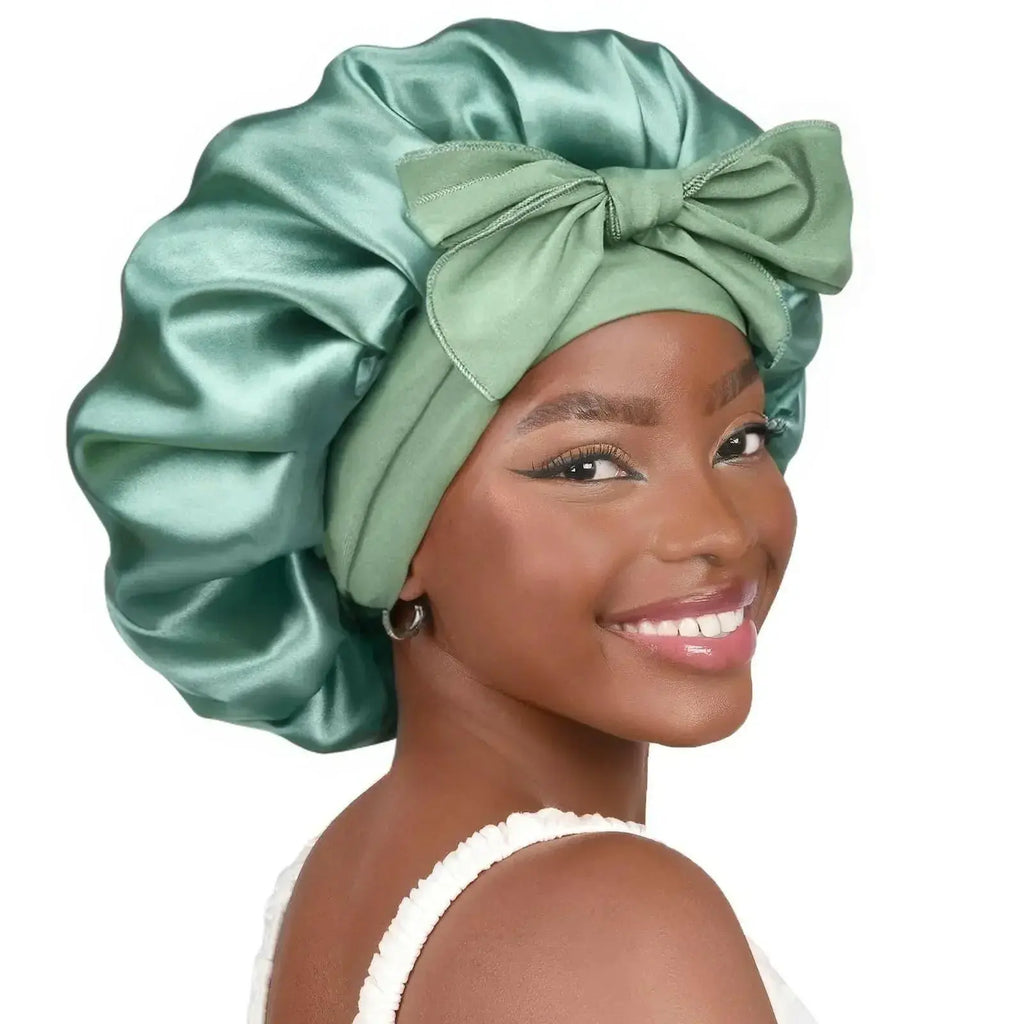 Double-layer satin ribbon hair bonnet by Plush Fashion Hub, designed for gentle hair protection and sleep comfort.