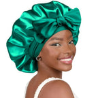 Double-layer satin ribbon hair bonnet by Plush Fashion Hub, featuring a round design with a decorative bow for hair protection.