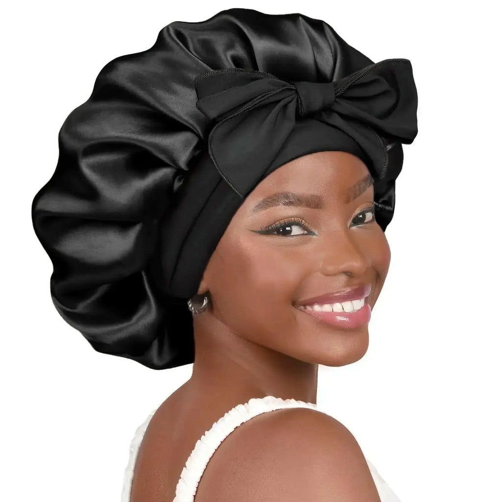 Double-layer satin ribbon hair bonnet from Plush Fashion Hub, designed for gentle hair protection during sleep.