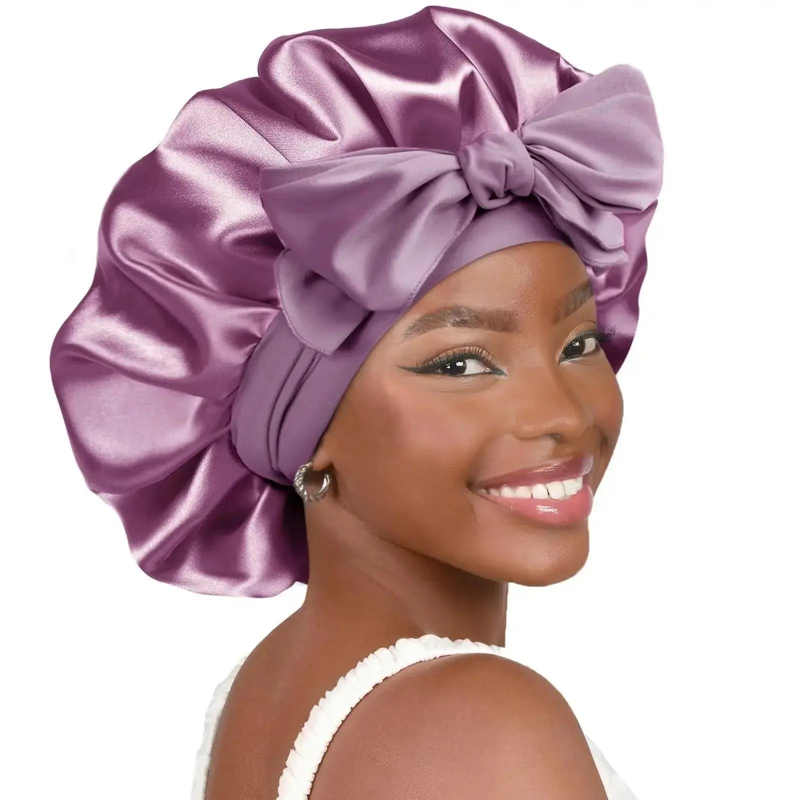 Double-layer satin ribbon hair bonnet with bow, plush fabric, designed for hair protection and sleep comfort.