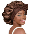 Double-layer satin ribbon hair bonnet from Plush Fashion Hub, designed for hair protection and sleep comfort.