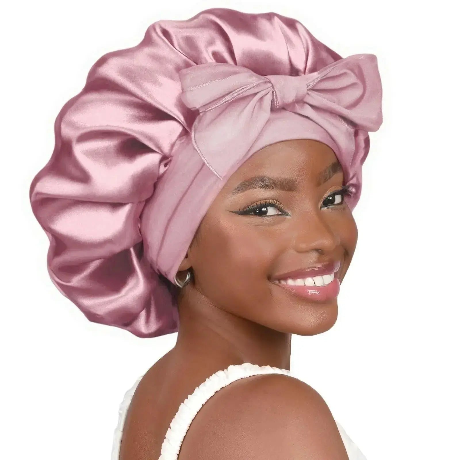 Double-layer satin ribbon hair bonnet with bow, plush fabric sleep cap designed for hair protection and gentle sleep care.