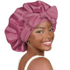 Double-layer satin ribbon hair bonnet by Plush Fashion Hub, plush sleep cap designed for hair protection and gentle styling.