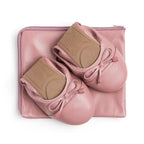 Talaria Flats dusty rose footwear folded on a bag, showcasing the stylish and comfortable design of these premium flats.