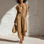 Women's deep V-neck three-quarter sleeve high waist wide-leg pants by FitiqueFit, shown in dark fabric with a relaxed fit.