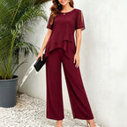 Women's irregular hem top and wide-leg pants matching set by FitiqueFit, stylish two-piece ensemble with casual and chic design.