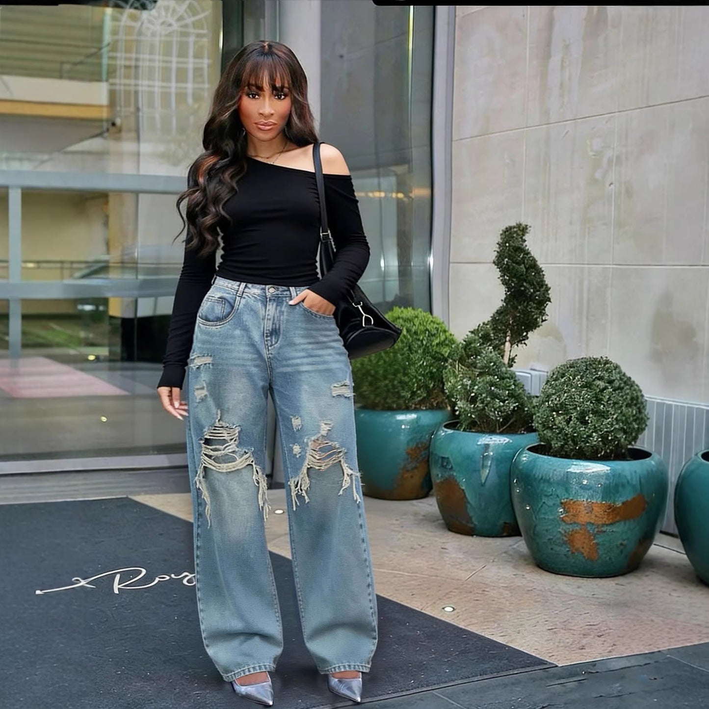 Layered patchwork ripped washed straight leg denim jeans by Plush Fashion Hub showing distressed details and classic fit.