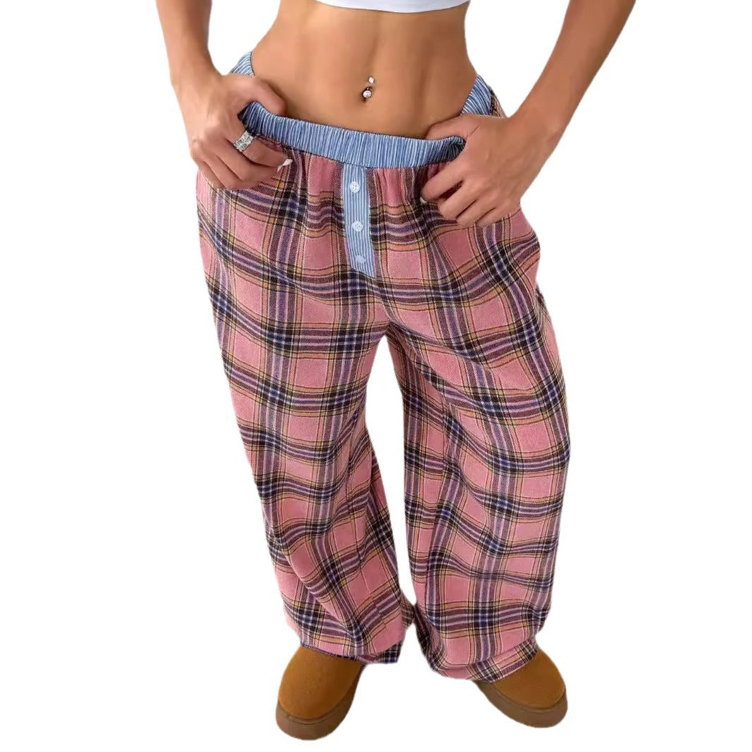 Light beige eprolo straight loose pants displayed on a hanger, showcasing their relaxed fit and soft fabric.