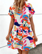 Women's tropical print shirt dress by Plush Fashion Hub, button front, short sleeves, collared A-line midi dress.