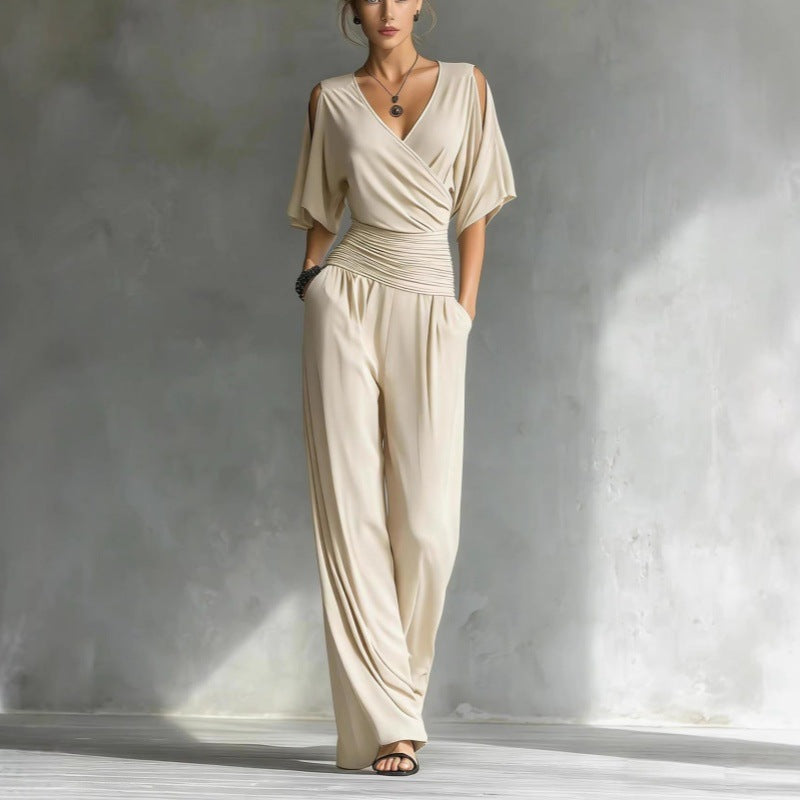 Women's V-neck slim fit straight leg jumpsuit by FitiqueFit, shown in a stylish, tailored design with a V-neck and sleek silhouette.