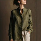 Women's loose-fit cotton linen long sleeve shirt with flip collar by FitiqueFit, shown in natural fabric and casual style.