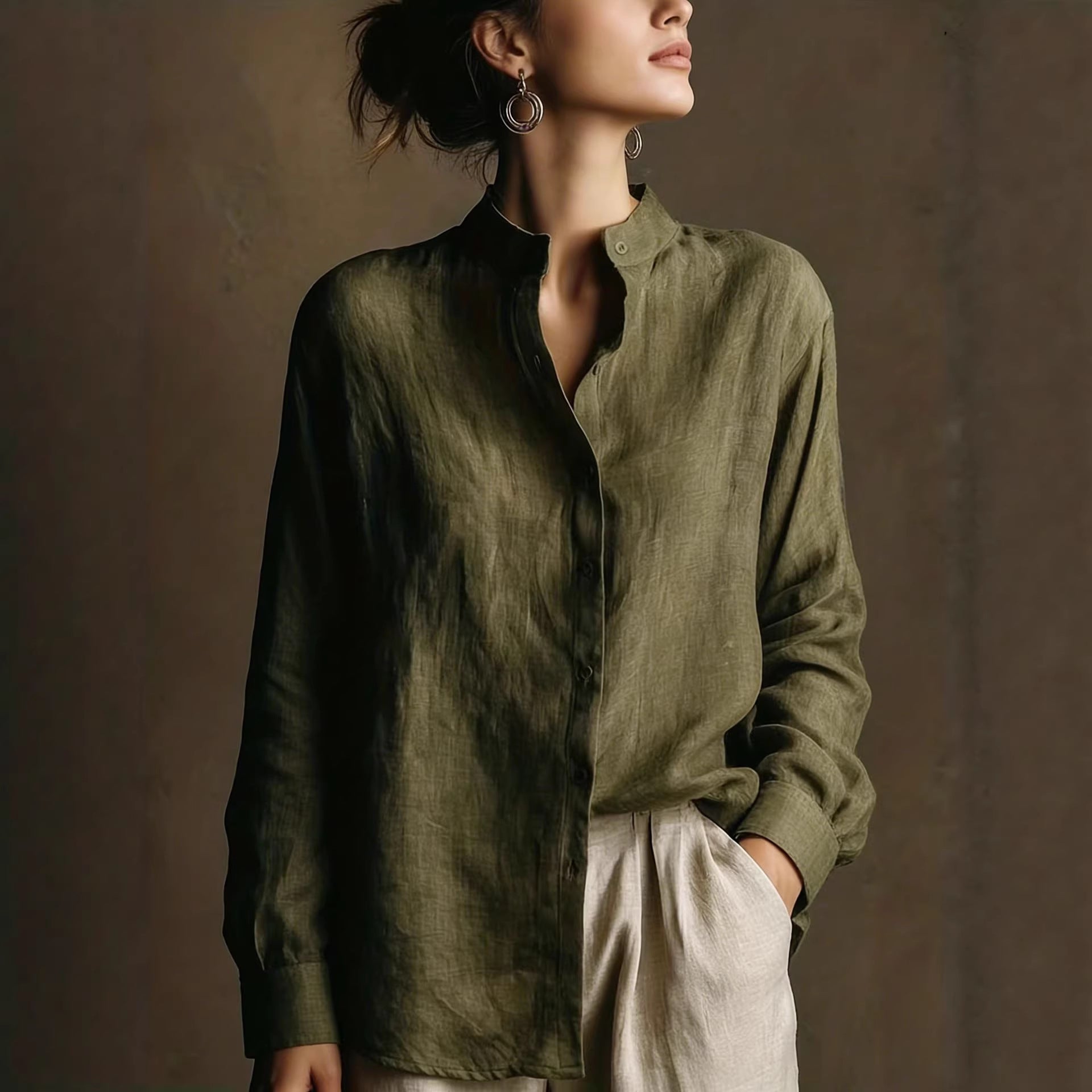 Women's loose-fit cotton linen long sleeve shirt with flip collar by FitiqueFit, shown in natural fabric and casual style.