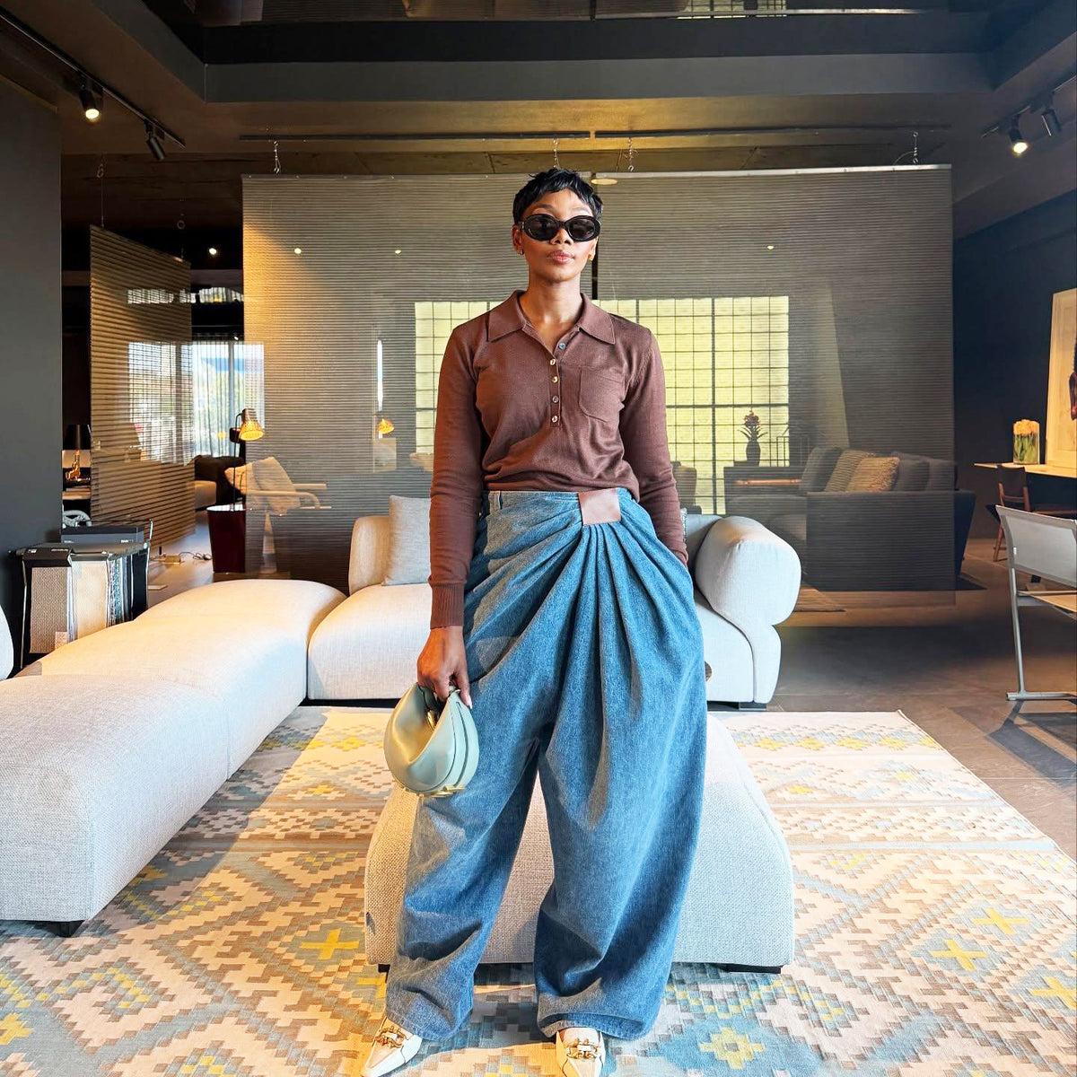 Asymmetric black PU high-waisted wide-leg jeans with flowing design, street style pants from eprolo.