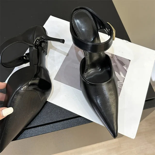Black patent leather pointed toe stiletto pumps by Plush Fashion Hub, stylish high heels with sleek design.