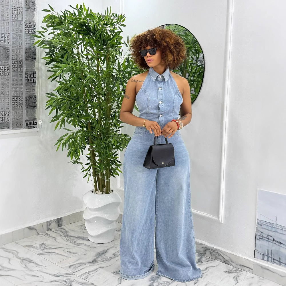 Women's backless washed denim halter jumpsuit by Plush Fashion Hub, featuring a stylish, sleeveless design and relaxed fit.