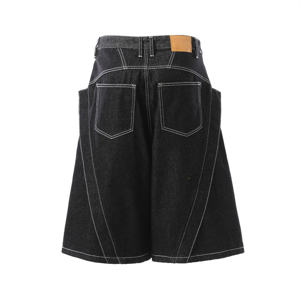 Black denim shorts with contrast white topstitching, two back pockets, and a tan leather waist label.
