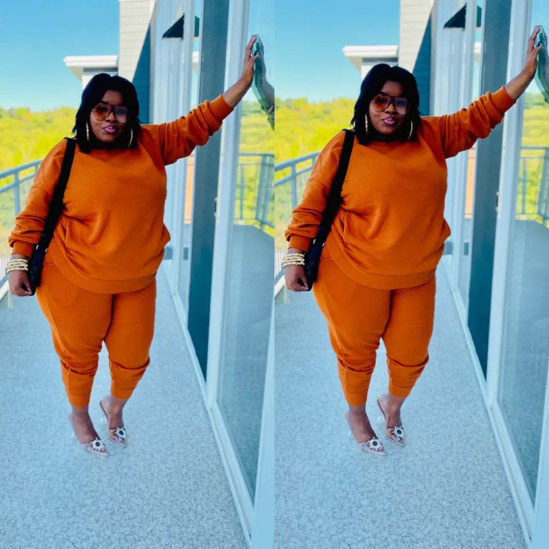 Plus size women's casual two-piece outfit featuring a comfortable top and matching pants from Trendy Attic Store01.
