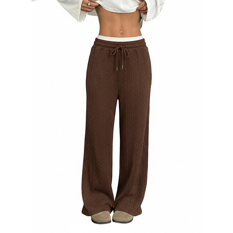 Brown cable knit wide-leg pants with a drawstring elastic waist.