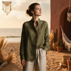 Women's loose-fit cotton linen long sleeve shirt with flip collar by FitiqueFit, shown in a casual, natural pose.