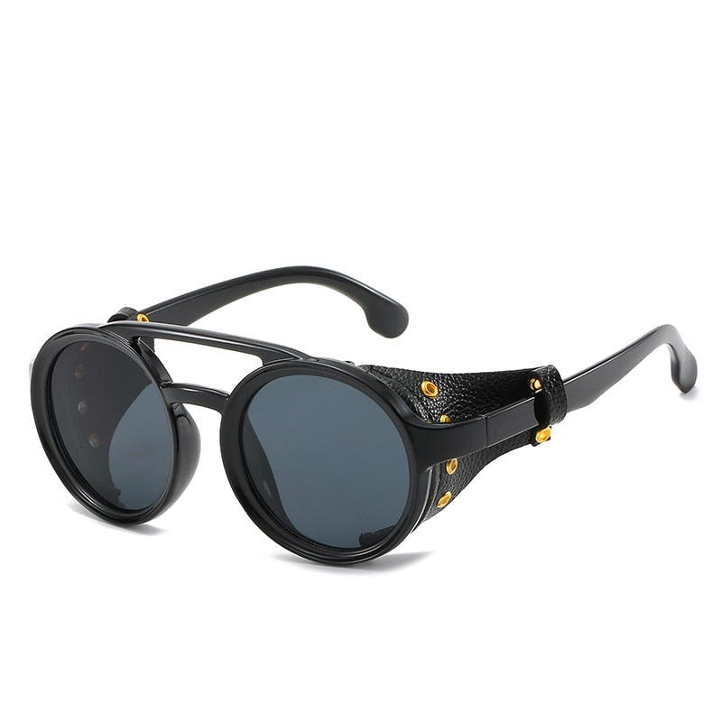 Round steampunk sunglasses by FitiqueFit featuring vintage-inspired metal frames and intricate design details.