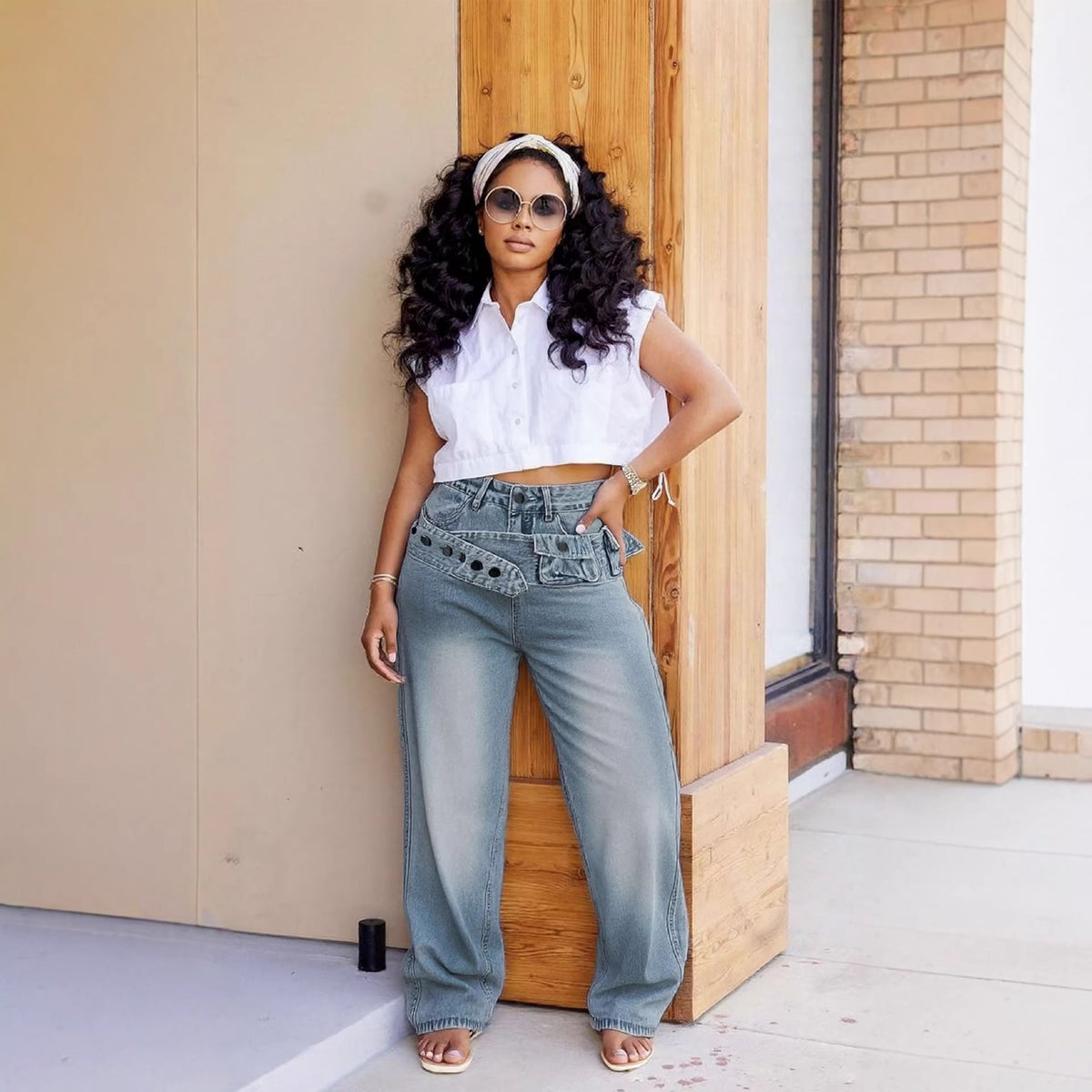 Distressed washed denim pants with multi-pocket design, belt, and street style look by eprolo.