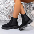 Women's ankle boots with modern elastic side panels, slip-on design, and comfortable chic style by Plush Fashion Hub.