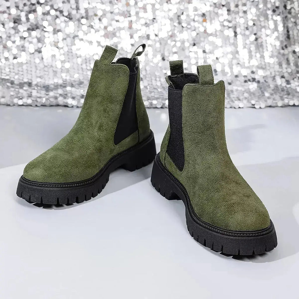 Women's modern ankle boots with elastic side panels in black, slip-on design, crafted by Plush Fashion Hub for comfort and style.