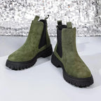 Women's modern ankle boots with elastic side panels in black, slip-on design, crafted by Plush Fashion Hub for comfort and style.