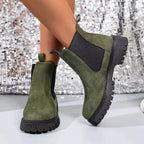 Women's ankle boots with modern elastic side panels from Plush Fashion Hub, featuring a chic slip-on design and comfortable fit.