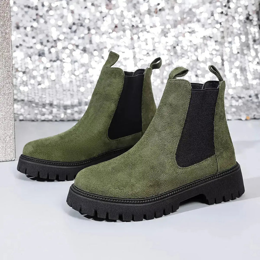 Women's modern ankle boots with elastic side panels and slip-on design from Plush Fashion Hub, featuring a chic, comfortable style.