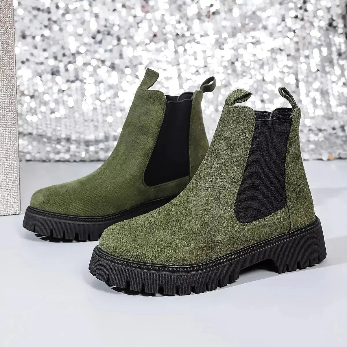 Women's modern ankle boots with elastic side panels and slip-on design from Plush Fashion Hub, featuring a chic, comfortable style.