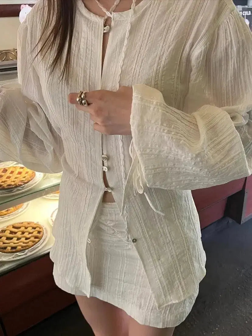 Elegant lace waist bandage long-sleeved shirt and skirt set by Plush Fashion Hub, stylish and sophisticated for fashion-forward looks.