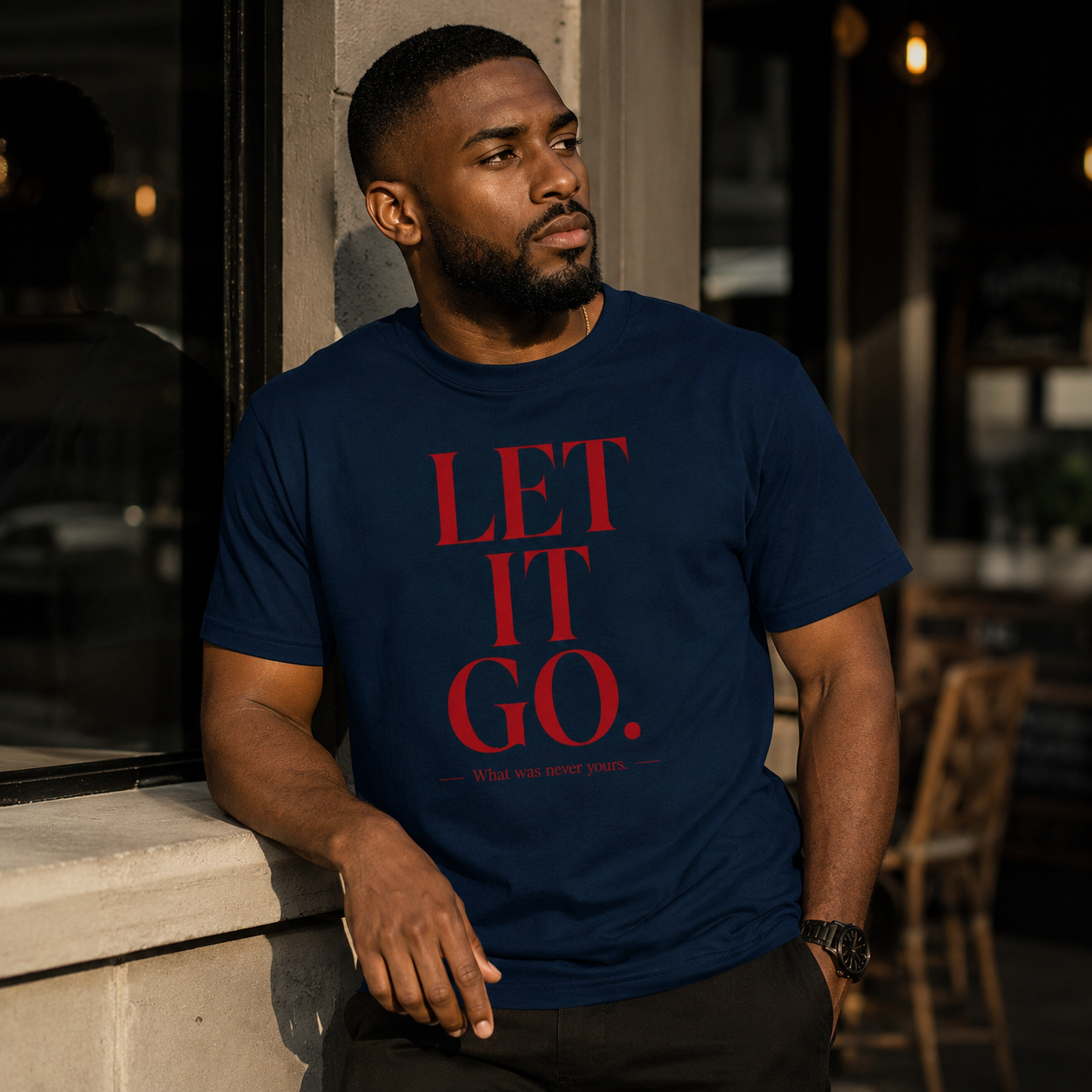 Wear Your Worship Let It Go T-Shirt from the SEEN: Unmasked Collection, featuring a casual black graphic tee with bold white text.