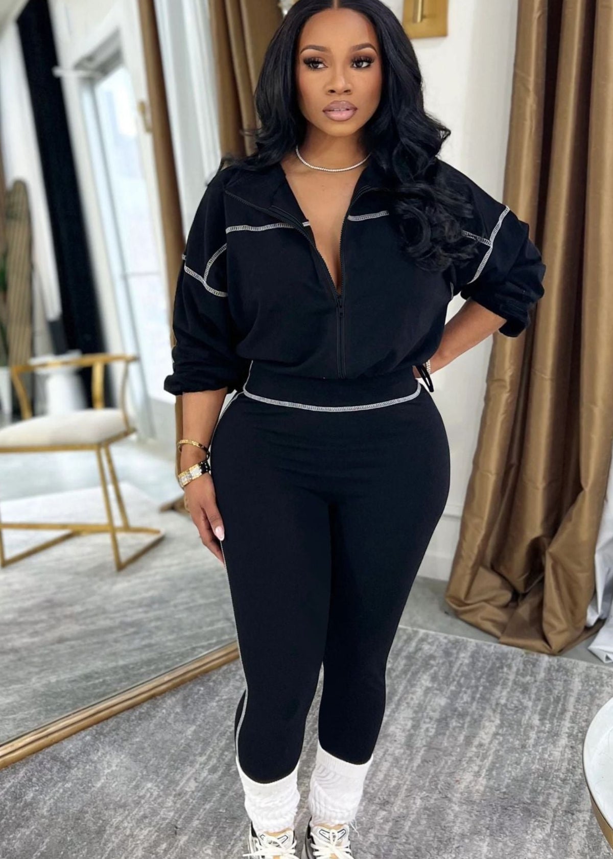 Modern zip-front long sleeve two-piece set by Plush Fashion Hub featuring a stylish top with a front zipper and long sleeves.