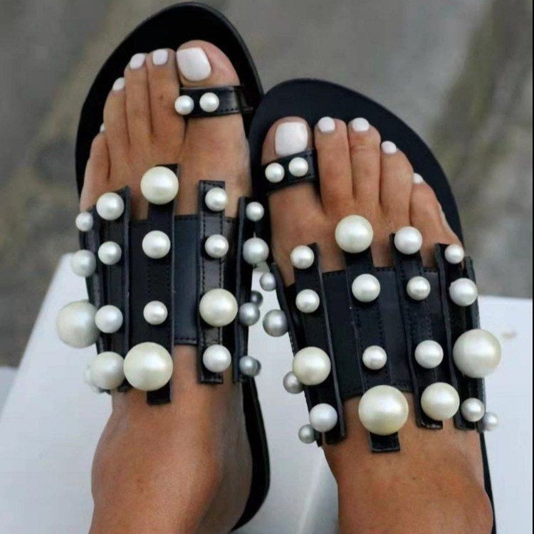 Pearl-embellished beach toe loop flat sandals by Plush Fashion Hub featuring comfortable slip-on design and stylish beach-ready look.