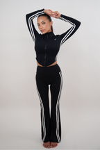 Black flare leggings by KIMITH BRAND, featuring a fitted design with flared legs for a stylish, comfortable look.
