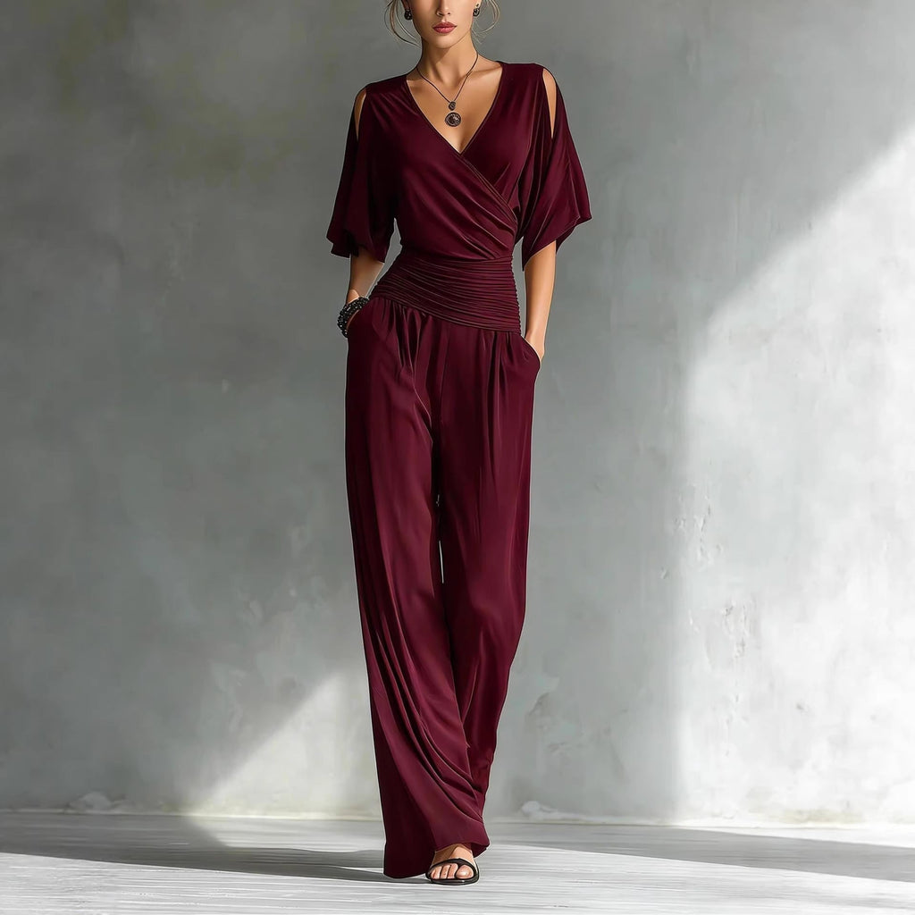 Women's V-neck slim fit straight leg jumpsuit by Plush Fashion Hub, shown in a stylish, fitted design on a model.