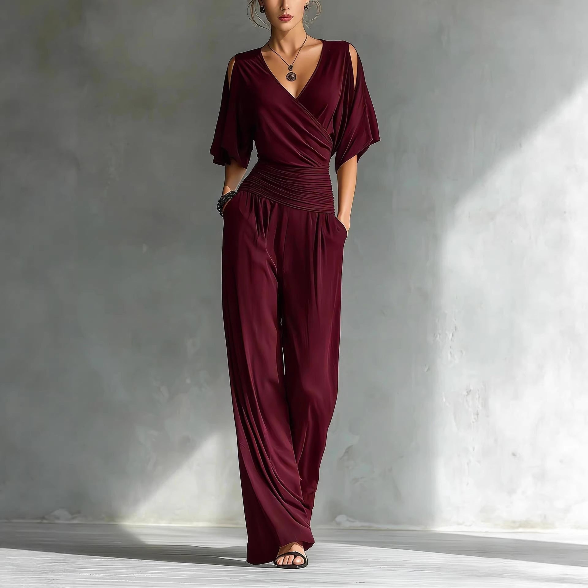 Women's V-neck slim fit straight leg jumpsuit by Plush Fashion Hub, shown in a stylish, fitted design on a model.