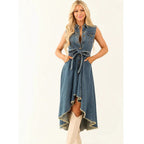 Women's sleeveless denim midi dress with irregular hem and button front by FitiqueFit, shown on a model with a casual background.