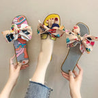 Women's summer flat slippers with bow detail, stylish Trendy Attic Store01 sandals, perfect for casual warm-weather wear.