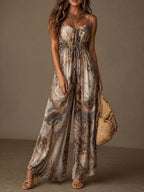 Women's printed backless camisole wide-leg jumpsuit by FitiqueFit featuring a stylish, flowy design and comfortable wide-leg fit.