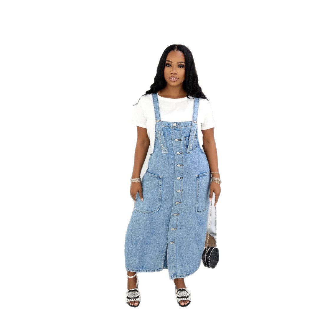 Women's sleeveless denim overall dress with single button closure by Plush Fashion Hub, shown hanging on a wooden hanger.